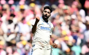 🏏 5 Cricketers Who Went From Gully To Glory: Real Stories Of Indian Street Cricket Legends 5 Siraj On Ground In His White Jersey With A Winning Expression