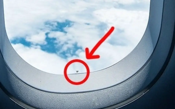 airplane windows have a tiny hole
