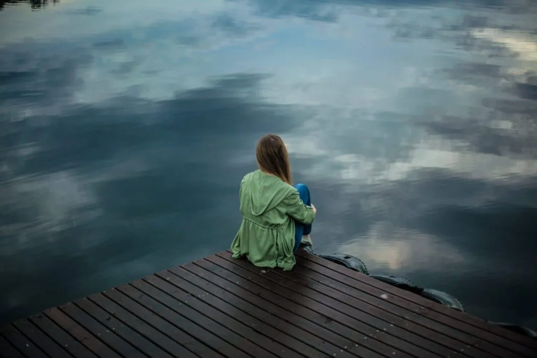 Why Being Alone Feels Addictive Now alone girl picture sitting quietly
