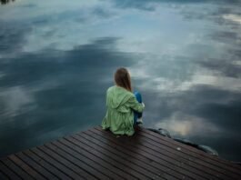 alone girl picture sitting quietly